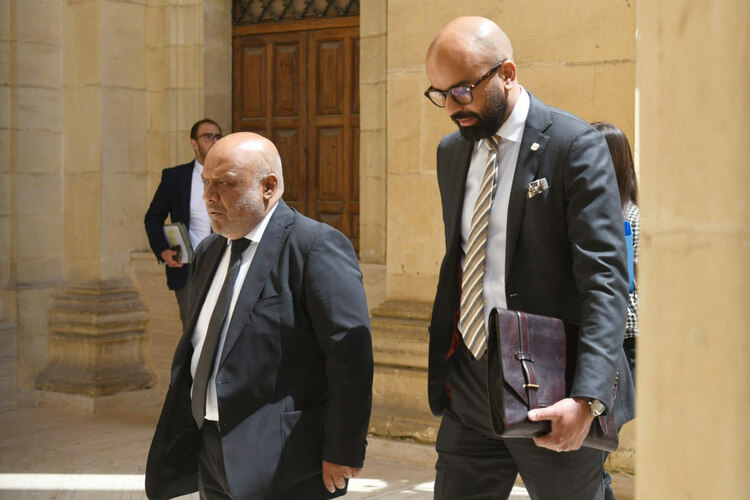 Asad Ali and his lawyer, Shazoo Ghaznavi